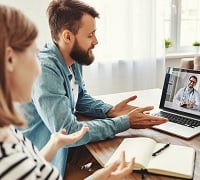 Couple having a remote consulation