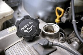 closeup engine oil cap in engine room of old car