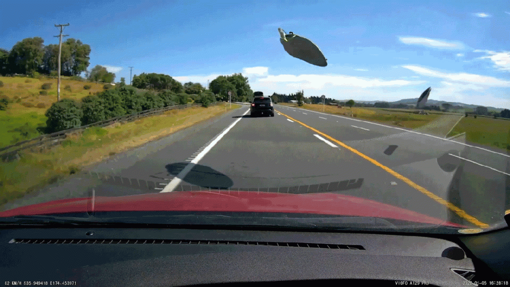 Surfboards Come Loose In Front Of Another Car In New Zealand