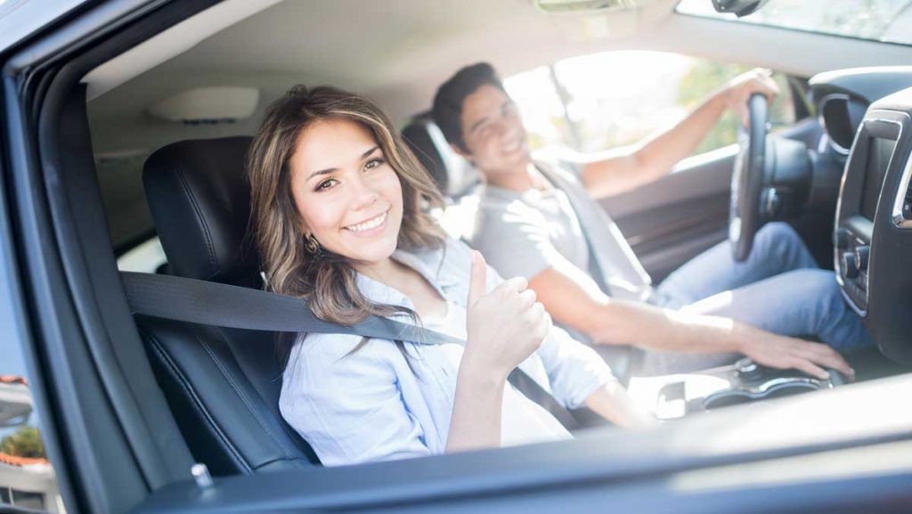 How long does it take to get car insurance - ouple in car ready to drive