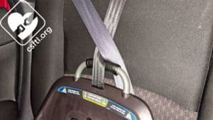 NUNA REVV tether crossing seatbelt