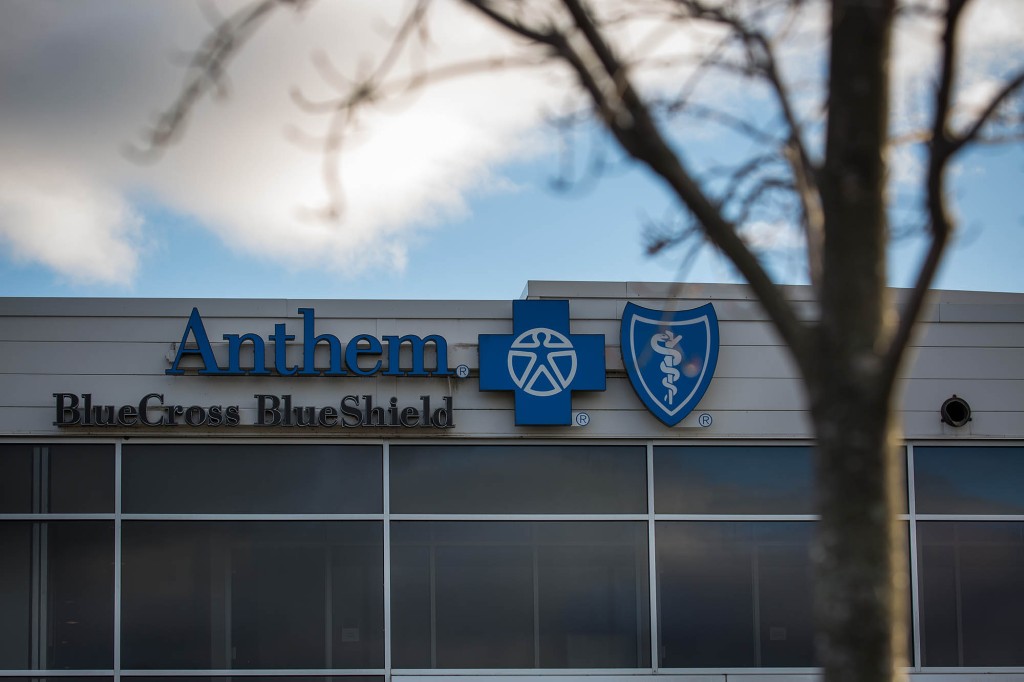 Signage is displayed on the exterior of an Anthem Inc. Blue Cross Blue Shield office building.