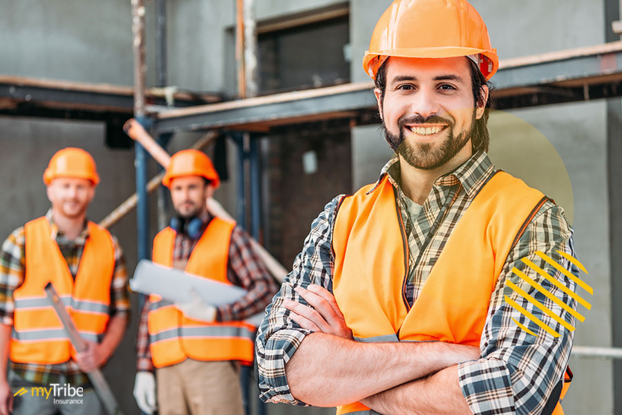 Workers with health insurance smiling