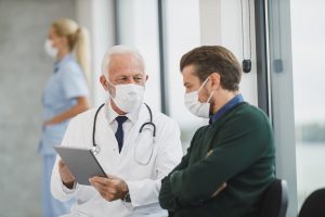 doctor talking to patient