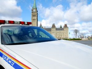 Police car in front of parliament