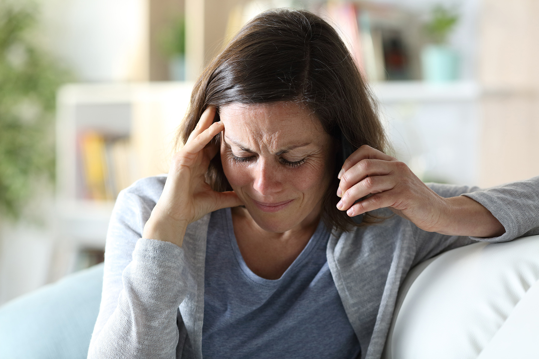 a woman calling a sexual abuse hotline for support