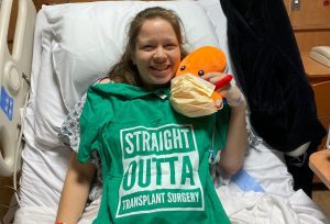 Kat Velkoff smiles for a photo after completing her kidney transplant