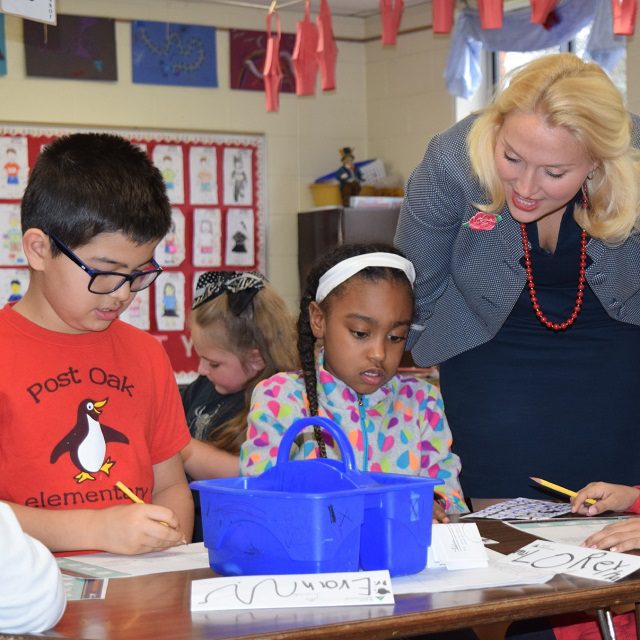 Danielle Robinson volunteers for Junior Achievement at Post Oak Academy in Lansing, Michigan. (Photo: Jackson)