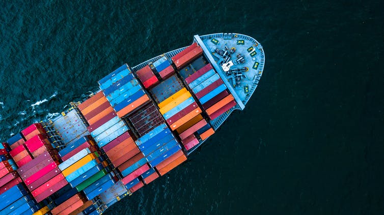 aerial view of container ship on ocean