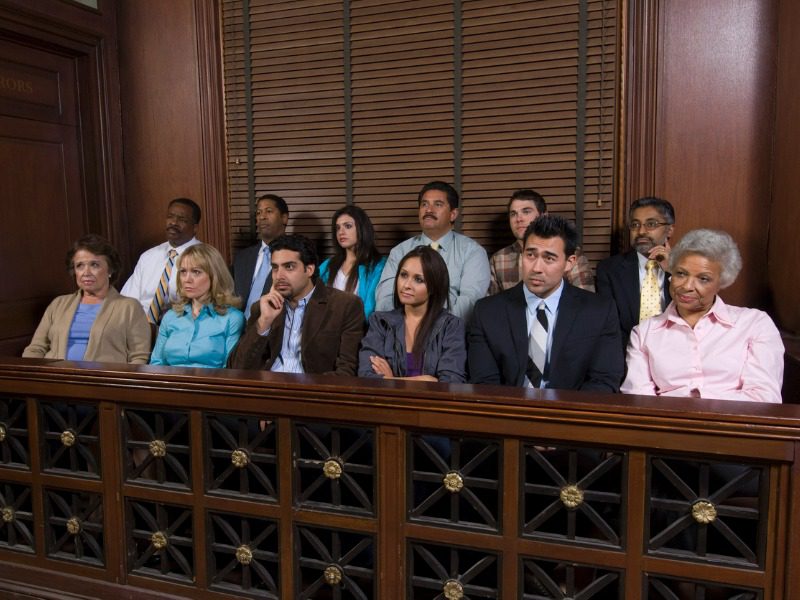 Jurors sitting in a court room box