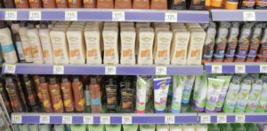 Do chemicals in sunscreens threaten aquatic life? A new report says a thorough assessment is 'urgently needed,' while also calling sunscreens essential protection against skin cancer