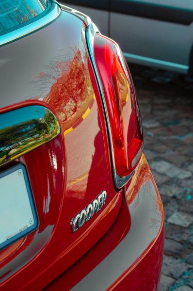 Close-up of detailing on the back of a red Mini Cooper