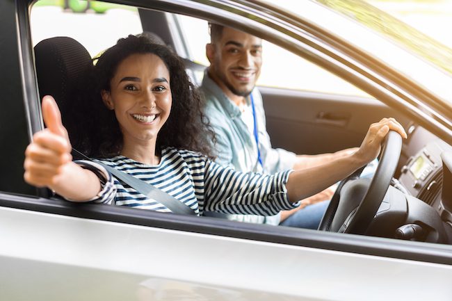 female learner driver at night