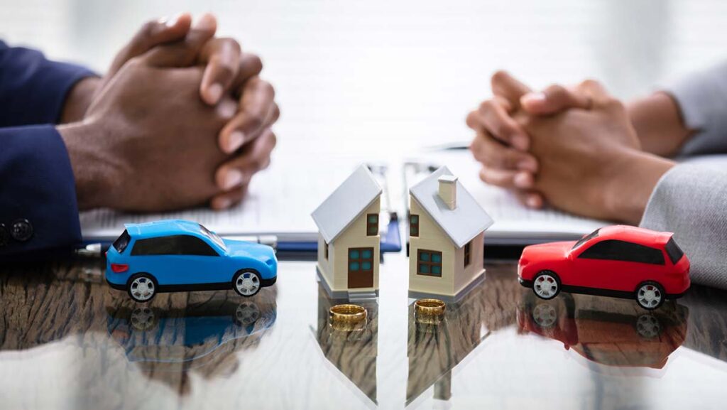 Divorce affects car insurance - people sorting out the matters of separation