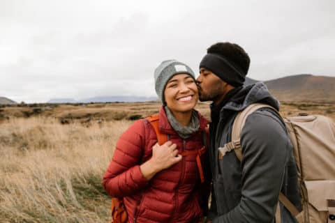 Young couple hiking and having fun in Iceland.