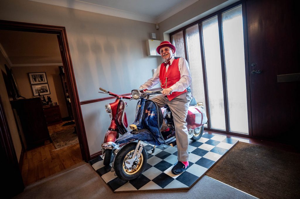 NSU and Lambretta scooters in hallway Mally Lamb