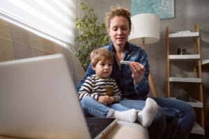 A mom checks her child's temperature