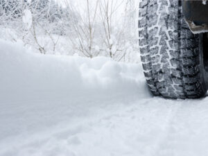 Close-up of a tire in the snow during winter