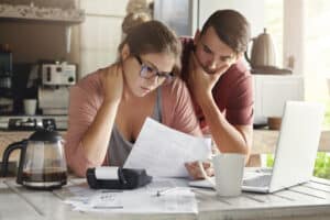 Couple applying for medical mortgage loan programs