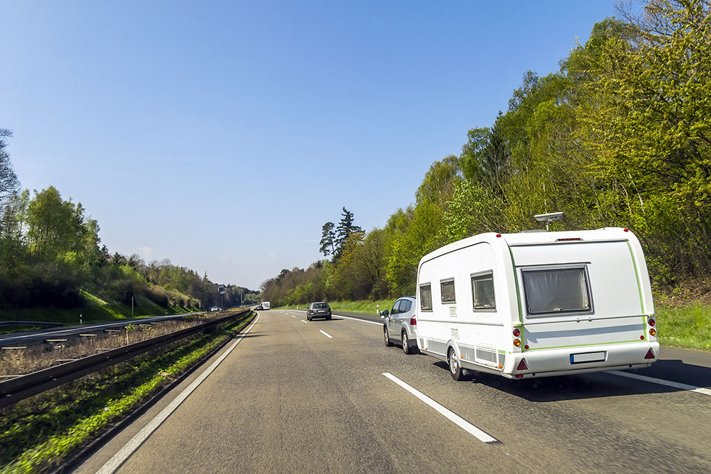 CRiS Numbers - Caravan or recreational vehicle motor home trailer on a freeway road