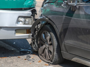 Collision between a bus and a car