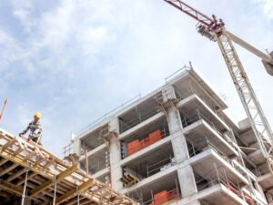 Large commercial building under construction.