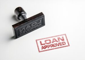 Stamp saying "Loan approved"