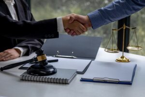 Close-up of male lawyer working in office.