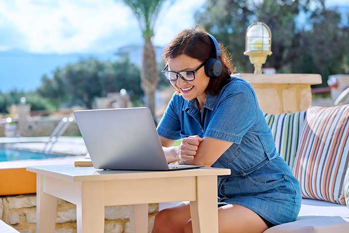 Woman using her laptop to get a quote for 40 year term life insurance