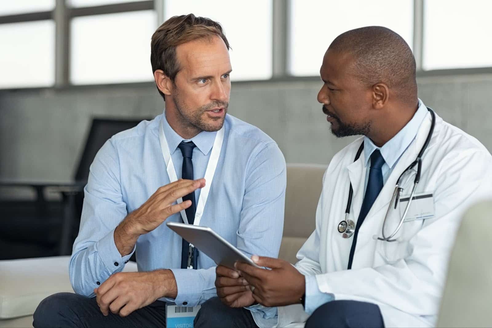Physician consulting with a client