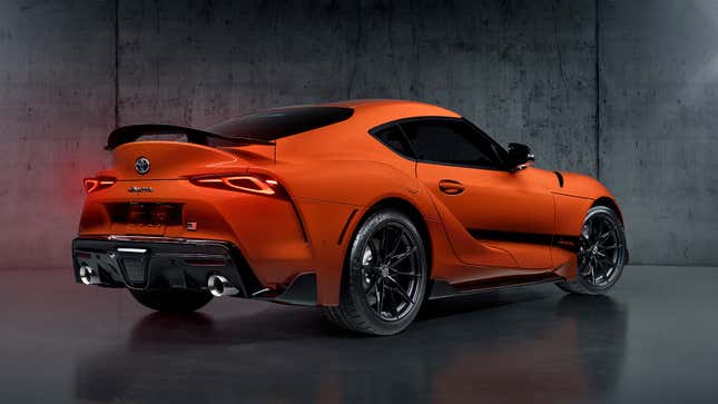 Rear quarter view of the orange 2024 GR Supra 45th Anniversary Edition.