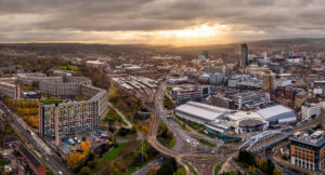 Aerial panorama of Sheffield cityscape skyline at sunset