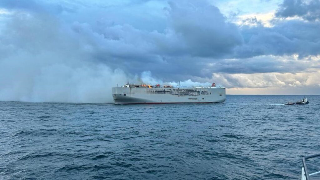 Cargo ship carrying nearly 3,000 cars catches fire, leaves one dead