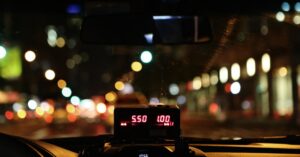 Taxi meter on vehicle dashboard