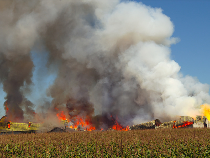 Smoke and fire from a barn explosion