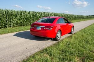 red car on a road