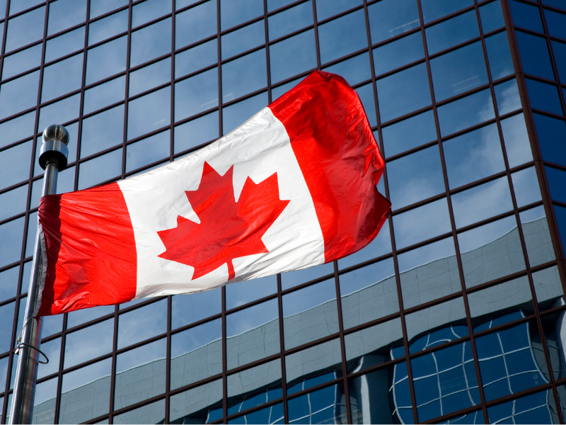 Business with Canadian flag in front