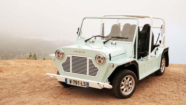 A photo of a Mini Moke electric vehicle. 