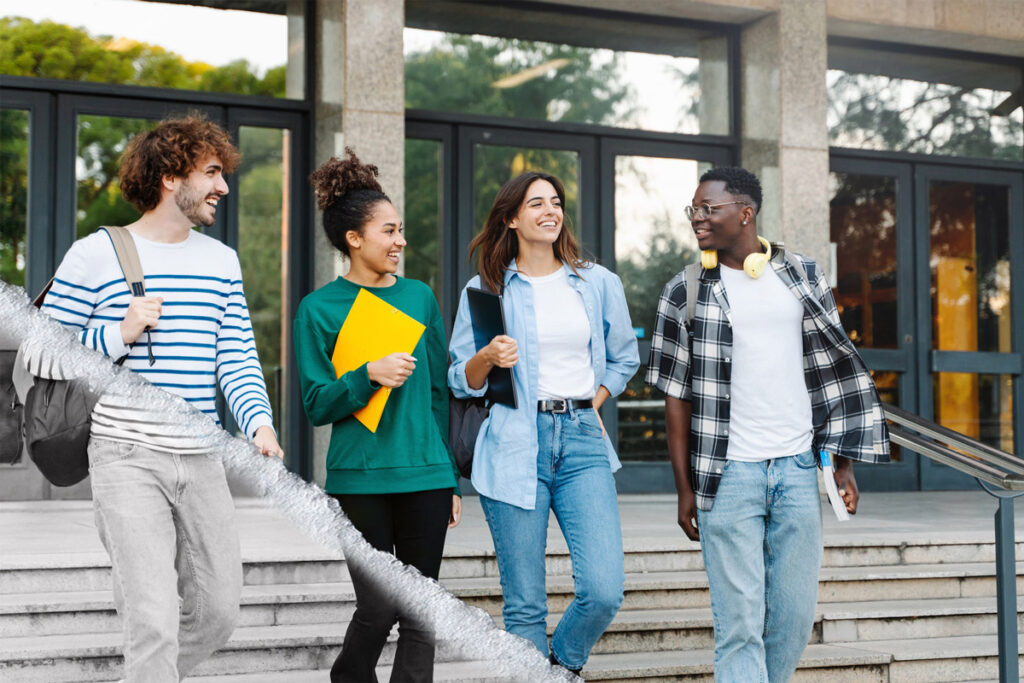 Four college students leave a lecture hall