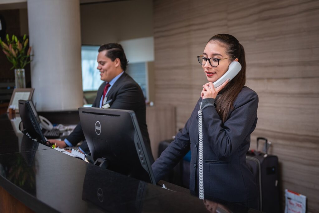 A Taxi Dispatch Operator answering the phone to a customer