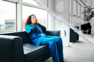 A nurse experiencing burnout takes a break on a couch, rubbing her eyes