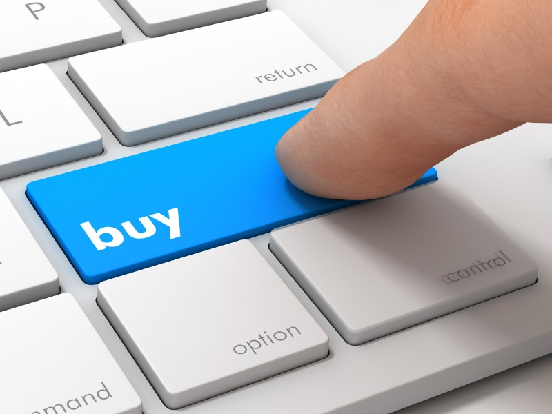 Pressing the 'buy' key to represent purchase of an insurance brokerage