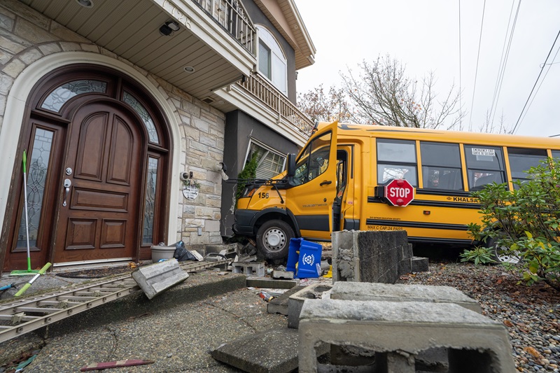 School bus crashes into a home in Burnaby, B.C.