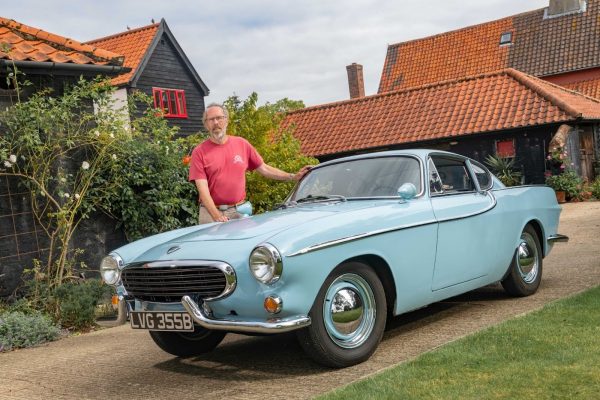 Mark Miller pictured with his Volvo P1800S