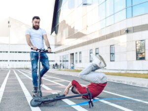 Person getting hurt while riding an e-scooter