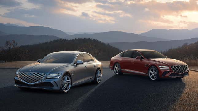 Front 3/4 view of two Genesis G80 sedans, one grey and one red