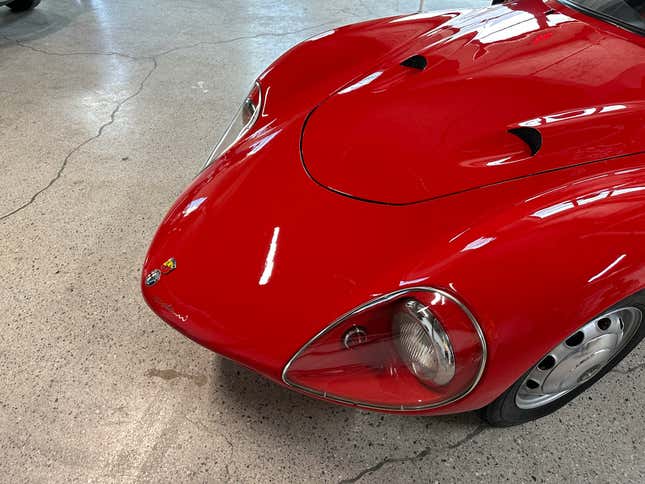 Detail shot of the hood of a red Luigi Colani Abarth-Alfa Romeo