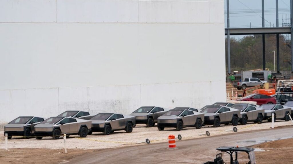 Video goes behind the scenes of Tesla Cybertruck construction, including shaping steel door panels