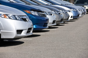 Who is covered by a taxi fleet insurance policy?