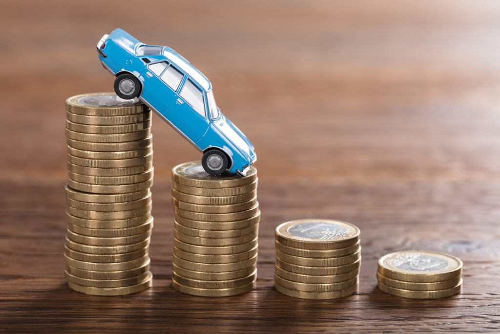 Why Car Dealers Face Plummeting Vehicle Values?